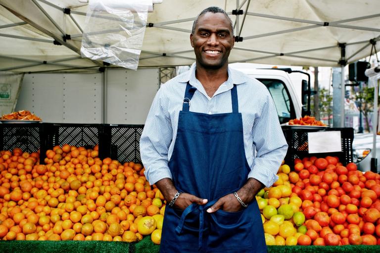 Farmers' Market Stand and Attendant